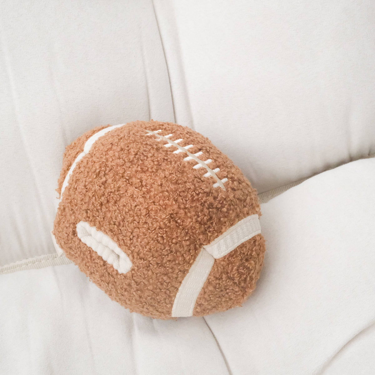 Lambwolf Collective's Squeaky Football Plush Dog Enrichment Toy